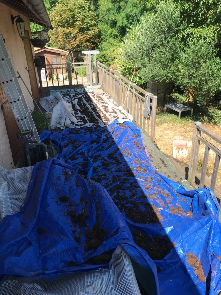 Protection et évacuation des déchets de toiture sur bâches lors d'un chantier Muller Toiture